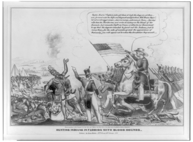 Schwarzes und weißes Foto einer Gruppe von Menschen, einige zu Pferde, mit einer Fahne im Hintergrund und dem Text "Jagen von Indianern in Florida mit Bluthunden" unten.