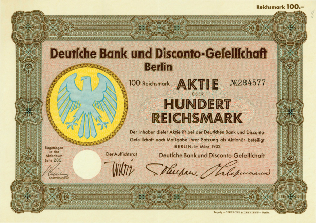 Alte deutsche Banknote mit einer Vogeldarstellung und der Aufschrift "Deutsche Bank und Disconto-Gefellichaft Berlin".