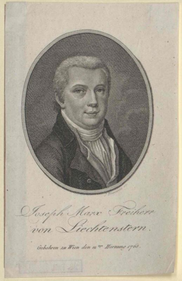 Porträt von Joseph Marx Freicher von Liechtenstein, einem deutschen Komponisten, in einem schwarzen Anzug und weißem Hemd mit ernstem Gesichtsausdruck, der ein Blatt Papier hält.