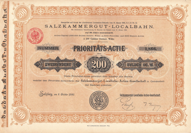 Ein altes Aktienzertifikat der Salzkammergut-Lokalbahn mit goldenem Rand, rotem Siegel und der Aufschrift "SALZKAMMERGUT LOCALBAHN" sowie der Zahl "200" in fetter schwarzer Schrift.