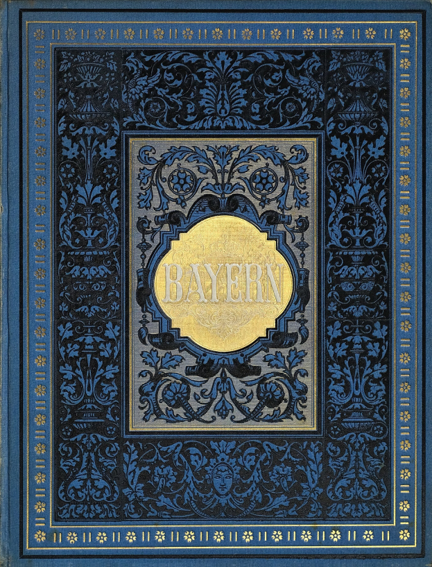 Ein blau-goldenes Buch mit dem Wort "Bayern" darauf, das mit detaillierten Designs verziert ist.